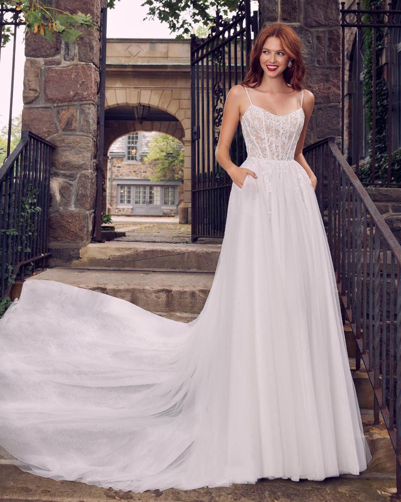 La22113 a line tulle wedding dress with pockets and scoop neckline1